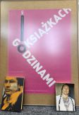 Zdjęcie przedstawia książkę i plakat