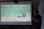 Zdjęcie przedstawia osoby podczas spotkanie z Marcinem Kostrzynskim